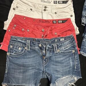 5 pairs of Miss Me Jean Shorts Distressed Style. Size 29 & 30. Red not included